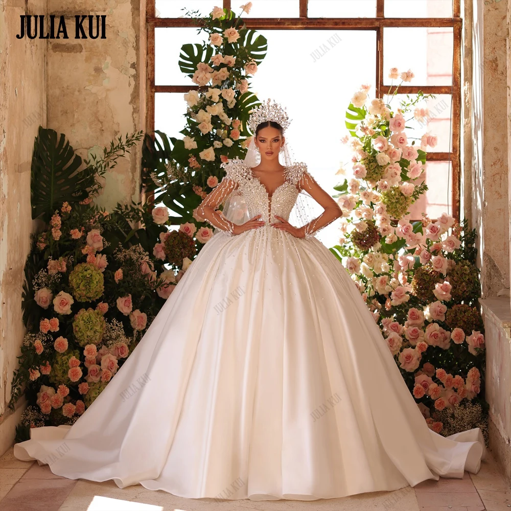 Julia Kui Luxury Satin Deep V-Neck Ball Gown Wedding Dresses Beading Pearls Illusion Sleeves Princess Bridal Gowns
Julia Kui Luxury Satin Deep V-Neck Ball Gown Wedding Dresses Beading Pearls Illusion Sleeves Princess Bridal Gowns