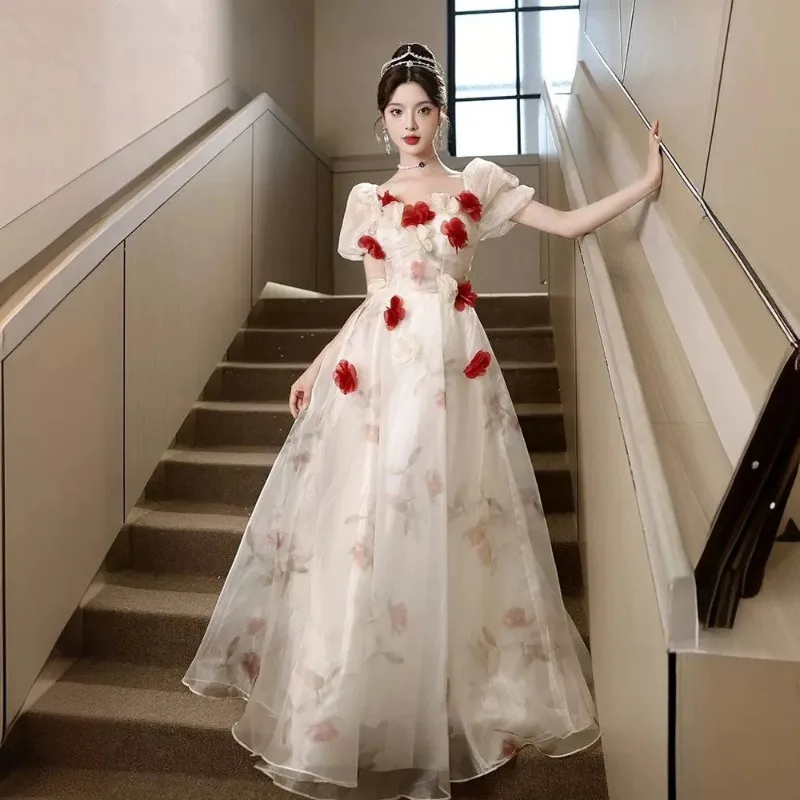 Элегантное вечернее платье, женское длинное платье в сказочном стиле с красным цветком, стиль принцессы для банкета, новинка 2023 года, элитное платье
Элегантное вечернее платье, женское длинное платье в сказочном стиле с красным цветком, стиль принцессы для банкета, новинка 2023 года, элитное платье