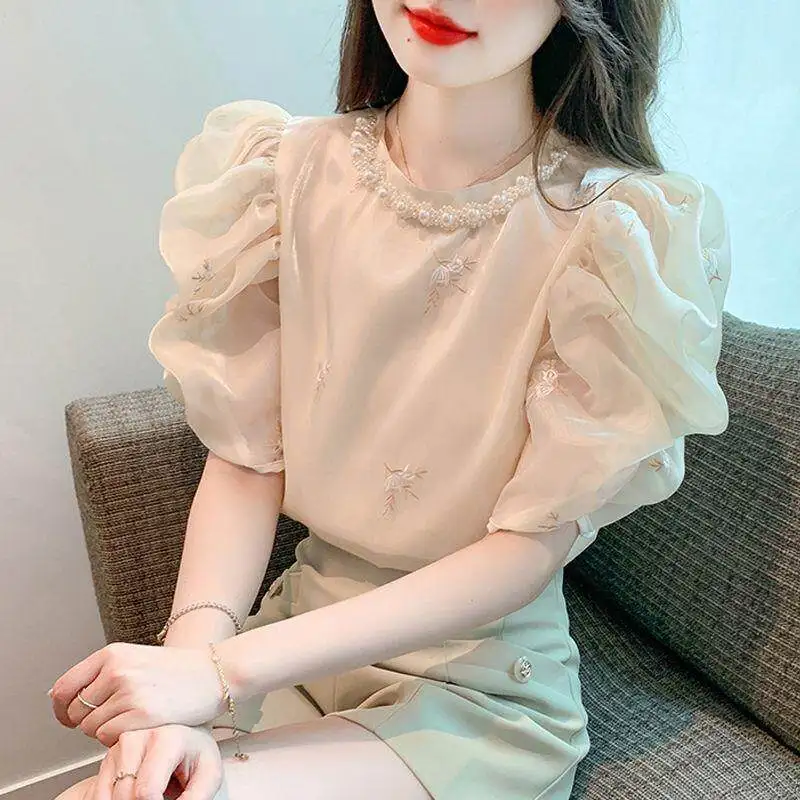 Spring Fall Women Pearls Embroidery Short Puff Sleeve Beige Top Shirt , Woman Sweet Ladies Beading Chiffon Tops Shirts
Spring Fall Women Pearls Embroidery Short Puff Sleeve Beige Top Shirt , Woman Sweet Ladies Beading Chiffon Tops Shirts