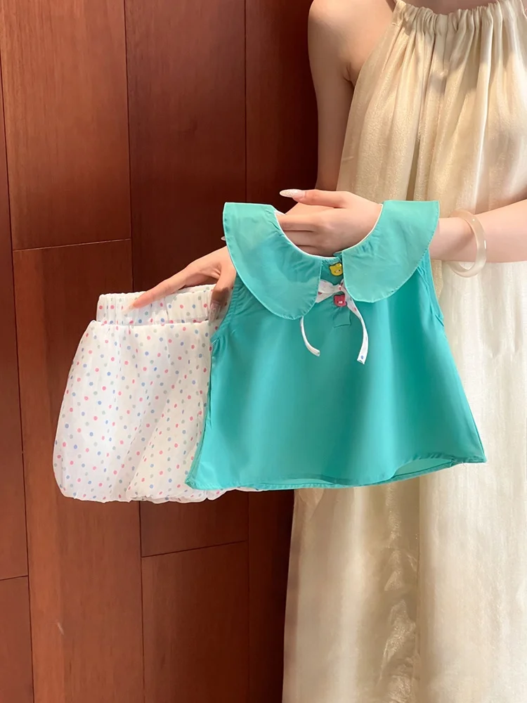 Fashionable Dopaamine Print Doll Collar Vest And Short Pants Set for Baby Girls Summer 2026 New Arrival Two Piece Suit
Fashionable Dopaamine Print Doll Collar Vest And Short Pants Set for Baby Girls Summer 2026 New Arrival Two Piece Suit