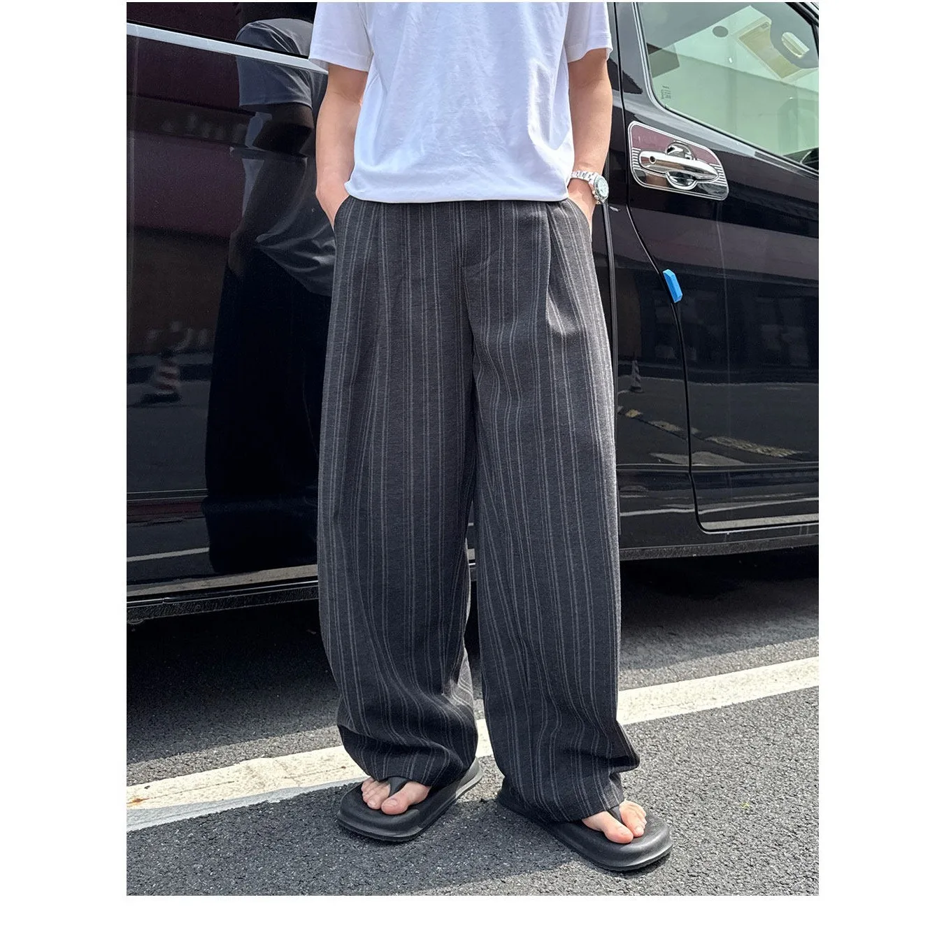 High street contrasting vertical stripe casual trousers for men in summer, loose silhouette, hanging down, floor length pants
High street contrasting vertical stripe casual trousers for men in summer, loose silhouette, hanging down, floor length pants