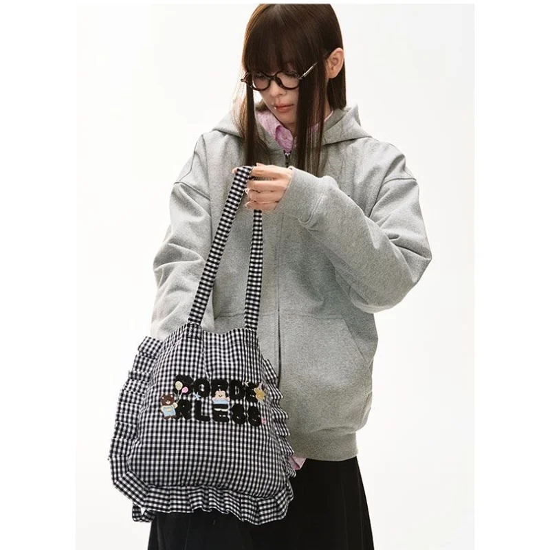 New Hello Kitty Canvas Bag Kawaii Girls Black and White Grid Ruffle Edge Shoulder Bag Korean Students Large Capacity Canvas Bag
New Hello Kitty Canvas Bag Kawaii Girls Black and White Grid Ruffle Edge Shoulder Bag Korean Students Large Capacity Canvas Bag