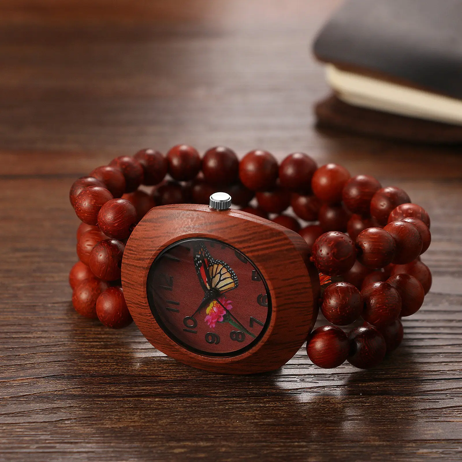 Women's wristwatch with butterfly-decorated dial, Bohemian-style wooden bead bracelet watch, wooden beaded strap, elastic strap, Arabic numeral markers
Women's wristwatch with butterfly-decorated dial, Bohemian-style wooden bead bracelet watch, wooden beaded strap, elastic strap, Arabic numeral markers