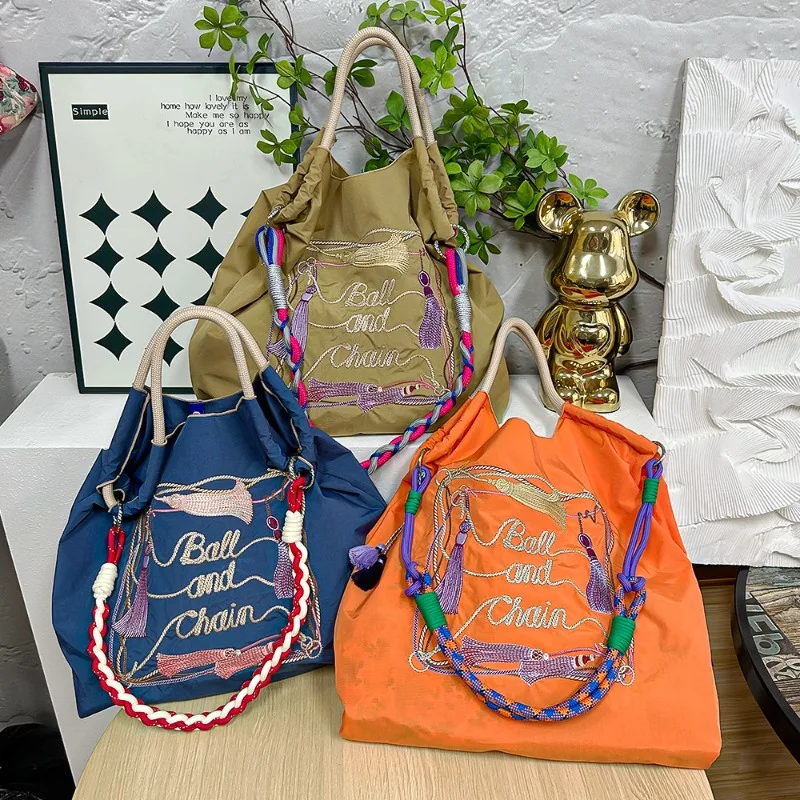 Without Shoulder Straps Ball Chain Cartoon Cute Embroidered Eco Friendly Bag Shopping Bag Fashion Nylon Handheld Single Bag
Without Shoulder Straps Ball Chain Cartoon Cute Embroidered Eco Friendly Bag Shopping Bag Fashion Nylon Handheld Single Bag