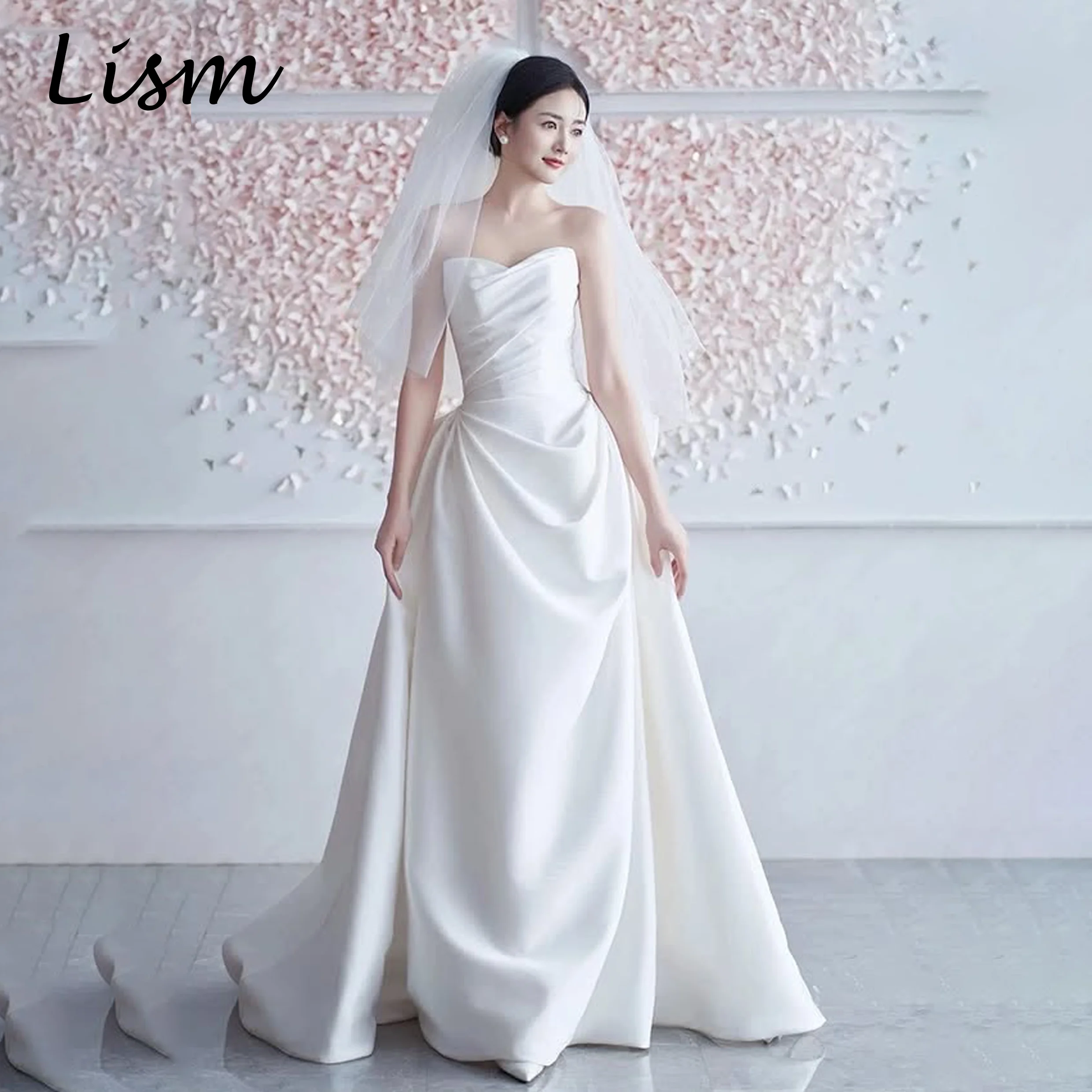 Lism Elegant Sleeveless Sweetheart Collar Wedding Dress Bow A-line Floor-Length Corset Back Satin Backless 웨딩드레스 2026 Customize
Lism Elegant Sleeveless Sweetheart Collar Wedding Dress Bow A-line Floor-Length Corset Back Satin Backless 웨딩드레스 2026 Customize