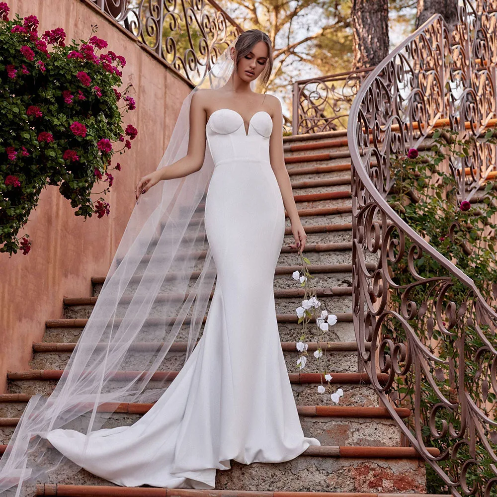 Customized Elegant Mermaid Wedding Dress Strapless Sweetheart Backless Long Train Bridal Dress 2026 Classic Brides Gown
Customized Elegant Mermaid Wedding Dress Strapless Sweetheart Backless Long Train Bridal Dress 2026 Classic Brides Gown