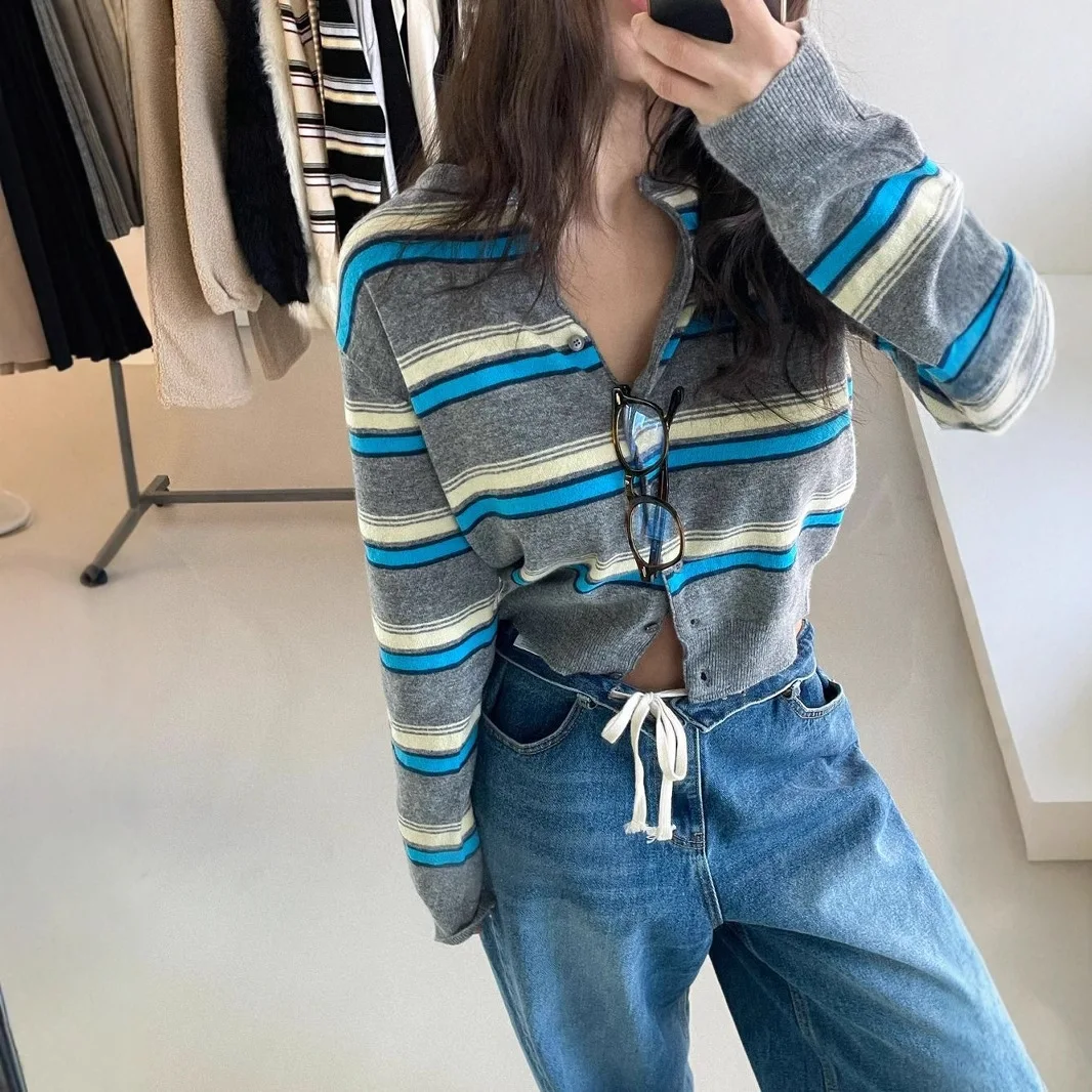 2026 Early Spring New Simple Color Matching Buckle Striped Knitted Sweater Women's Versatile Small Coat
2026 Early Spring New Simple Color Matching Buckle Striped Knitted Sweater Women's Versatile Small Coat