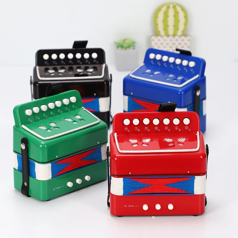 Mini children's accordion, educational instrument toy music early education holiday gift 7 key bass 17 key instrument
Mini children's accordion, educational instrument toy music early education holiday gift 7 key bass 17 key instrument