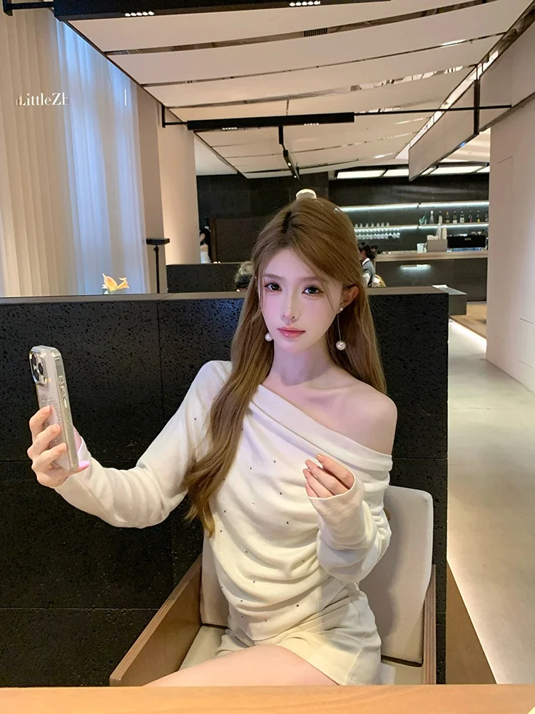 Корейский вязаный топ Pure Desire с асимметричным плечом, термотрансферным принтом в виде ромбов, свободным воротником, длинными рукавами и укороченной длиной для женщин.
Корейский вязаный топ Pure Desire с асимметричным плечом, термотрансферным принтом в виде ромбов, свободным воротником, длинными рукавами и укороченной длиной для женщин.