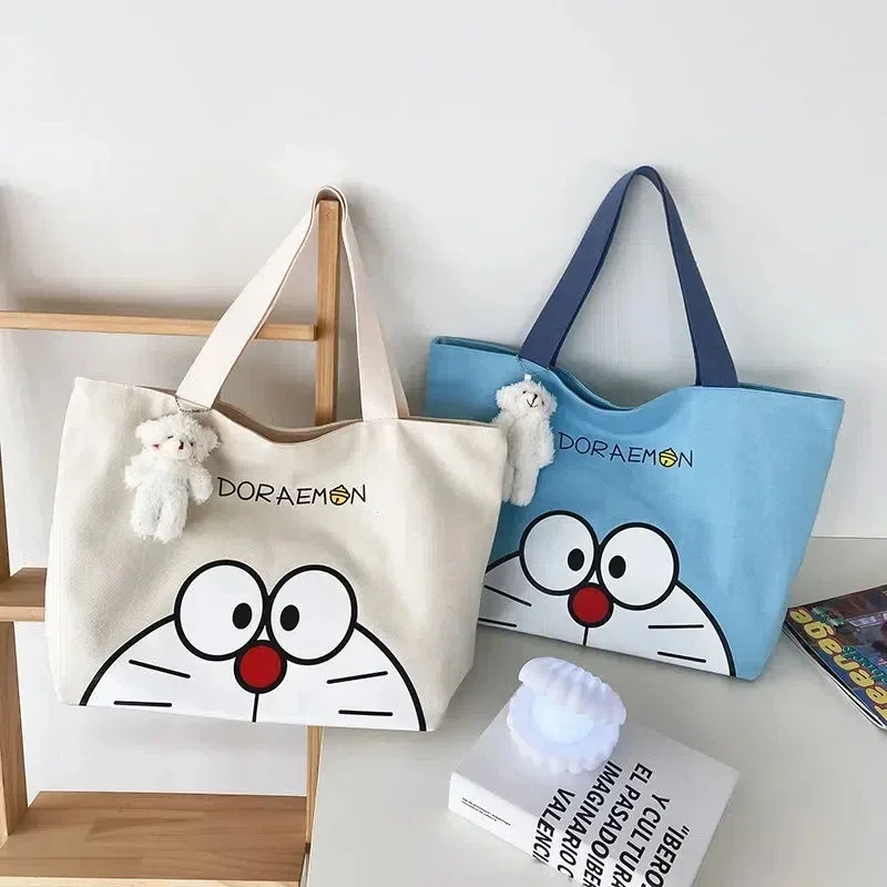 Doraemon Canvas hand Bag Girl children Tote Bag New Large Capacity Cartoon Shoulder Bag 35x15x30cm
Doraemon Canvas hand Bag Girl children Tote Bag New Large Capacity Cartoon Shoulder Bag 35x15x30cm