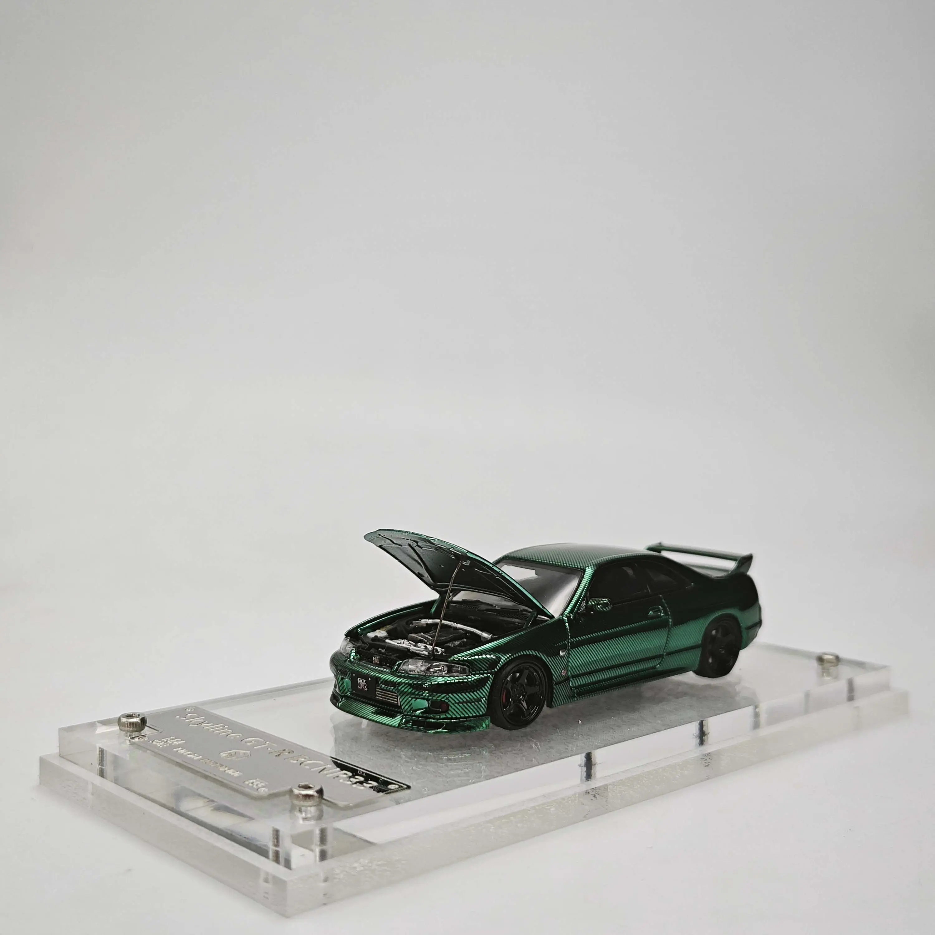 FH 1/64 R3BCNR33 Original Version Electroplated All-Carbon Green Alloy Car Model
FH 1/64 R3BCNR33 Original Version Electroplated All-Carbon Green Alloy Car Model