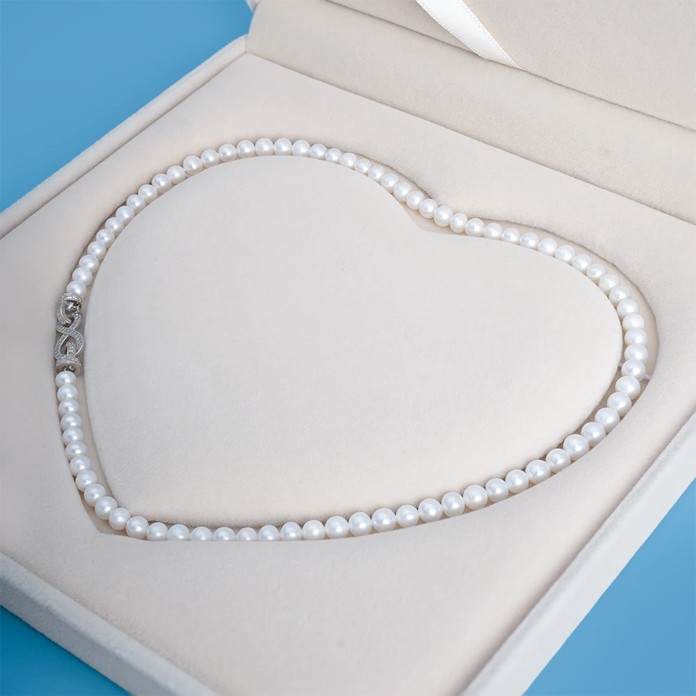 45cm natural freshwater purple 5-6mm AAA pearl necklace with 925 sterling silver and jewelry box
45cm natural freshwater purple 5-6mm AAA pearl necklace with 925 sterling silver and jewelry box