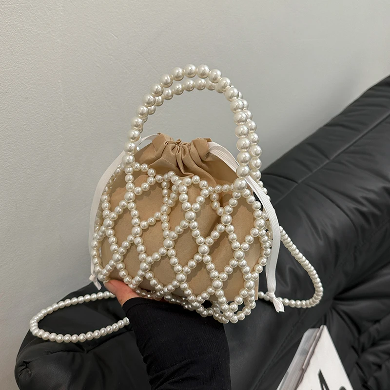 French Retro Handbag Fairy Popular Woven Beaded Bucket Bag Crossbody Bag Summer Niche Design Hollowed Out Pearl Bag Women Bag
French Retro Handbag Fairy Popular Woven Beaded Bucket Bag Crossbody Bag Summer Niche Design Hollowed Out Pearl Bag Women Bag