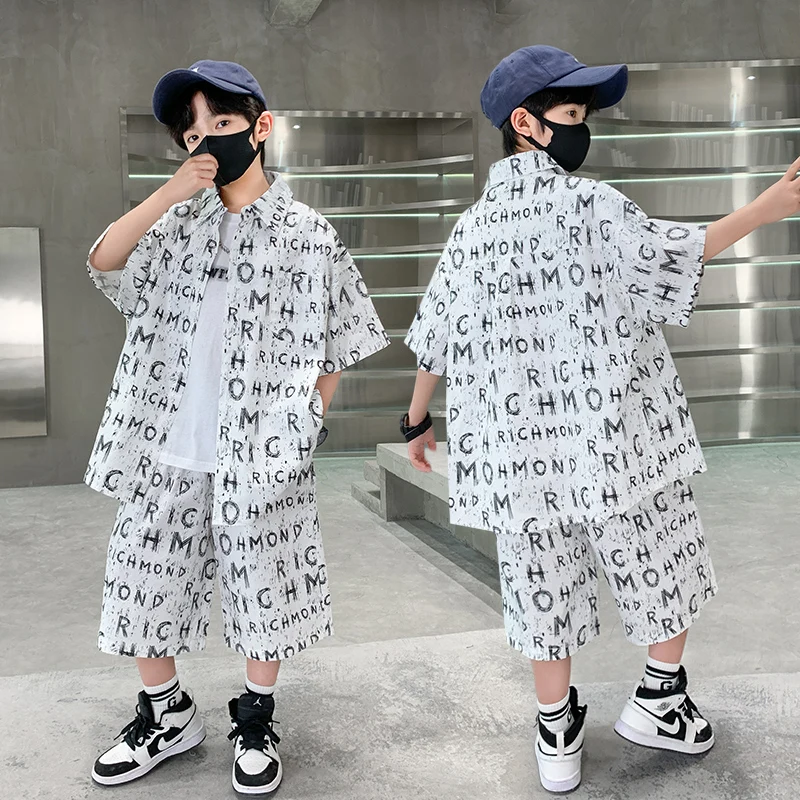 Korean Boys Fashion Letter Print Shorts and Shirt Set Summer Clothing Suit 5-14 Years Kids Child Cool Stylish Streetwear Outfit
Korean Boys Fashion Letter Print Shorts and Shirt Set Summer Clothing Suit 5-14 Years Kids Child Cool Stylish Streetwear Outfit