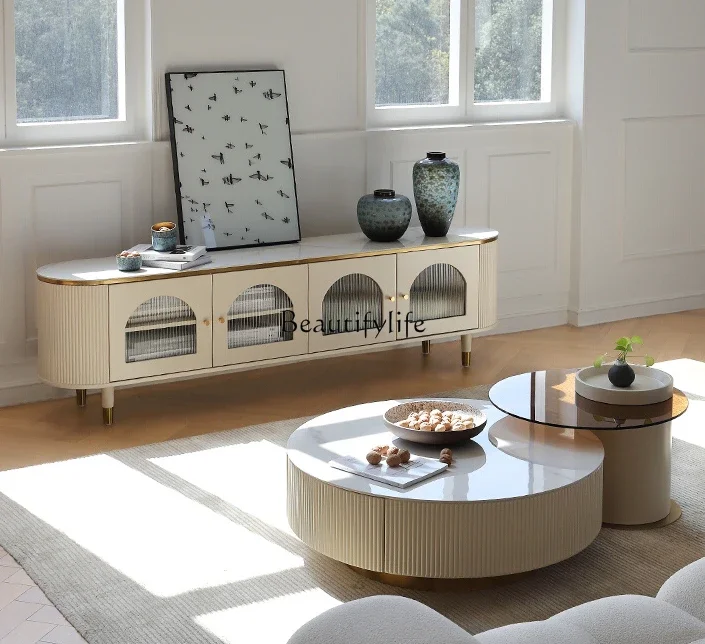 Italian light luxury rock slab coffee table TV cabinet combination modern simple small apartment glass small round table
Italian light luxury rock slab coffee table TV cabinet combination modern simple small apartment glass small round table