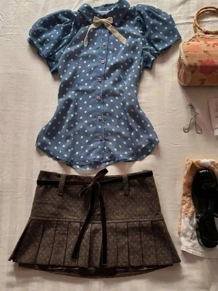 Summer New Sweet Girl College Style High-end Temperature Polka Dot Puff Sleeve Shirt Top and Slim Pleated Skirt 2 Pieces Suit
Summer New Sweet Girl College Style High-end Temperature Polka Dot Puff Sleeve Shirt Top and Slim Pleated Skirt 2 Pieces Suit