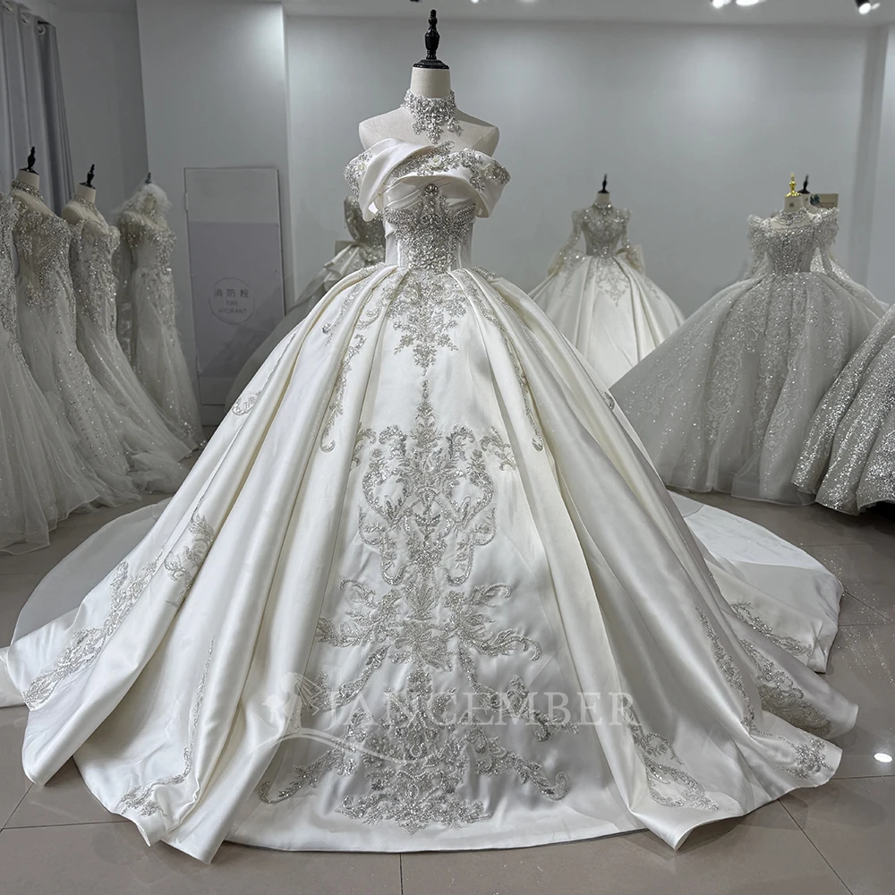Customized Sparkling Strapless Satin Wedding Dress Floral Factory Wholesale Short Sleeves Beading Bridal Gowns vestido novia
Customized Sparkling Strapless Satin Wedding Dress Floral Factory Wholesale Short Sleeves Beading Bridal Gowns vestido novia