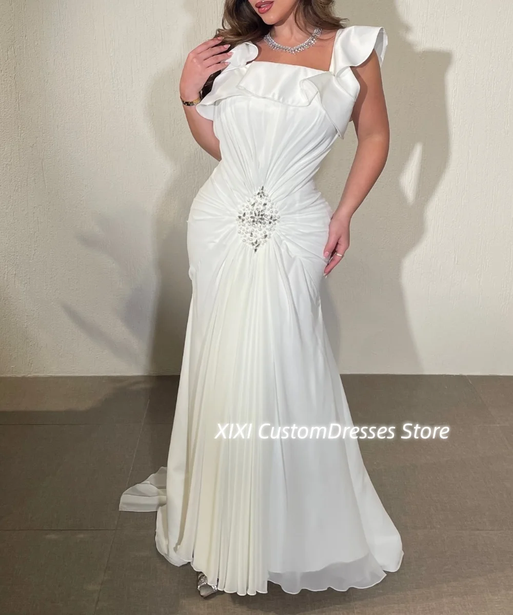 Платья длиной до пола с квадратным вырезом белой русалки по индивидуальному заказу для выпускного вечера, платья на молнии без рукавов с бисером для Spe
Платья длиной до пола с квадратным вырезом белой русалки по индивидуальному заказу для выпускного вечера, платья на молнии без рукавов с бисером для Spe