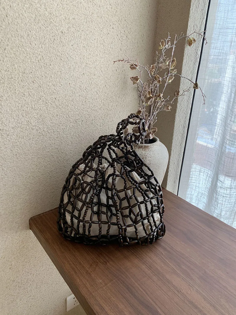 Women Woven Hand Bag Hollow-out Wooden Bead Bag Bucket Shoulder Bag Female Reticulate Netted Beach Handbag
Women Woven Hand Bag Hollow-out Wooden Bead Bag Bucket Shoulder Bag Female Reticulate Netted Beach Handbag