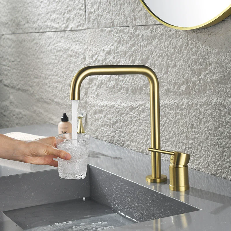 Широко распространенный смеситель для раковины, латунная щетка, золотой смеситель для раковины в ванной комнате, одна ручка, вращающийся кран для горячей и холодной воды 
Широко распространенный смеситель для раковины, латунная щетка, золотой смеситель для раковины в ванной комнате, одна ручка, вращающийся кран для горячей и холодной воды