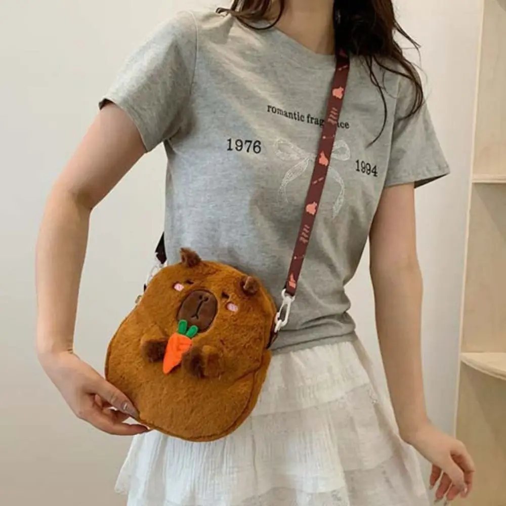 Animal Cartoon Capybara Plush Shoulder Bag Zipper Stuffed Capybara Crossbody Bag Large Capacity Cute Cartoon Capybara Handbag
Animal Cartoon Capybara Plush Shoulder Bag Zipper Stuffed Capybara Crossbody Bag Large Capacity Cute Cartoon Capybara Handbag