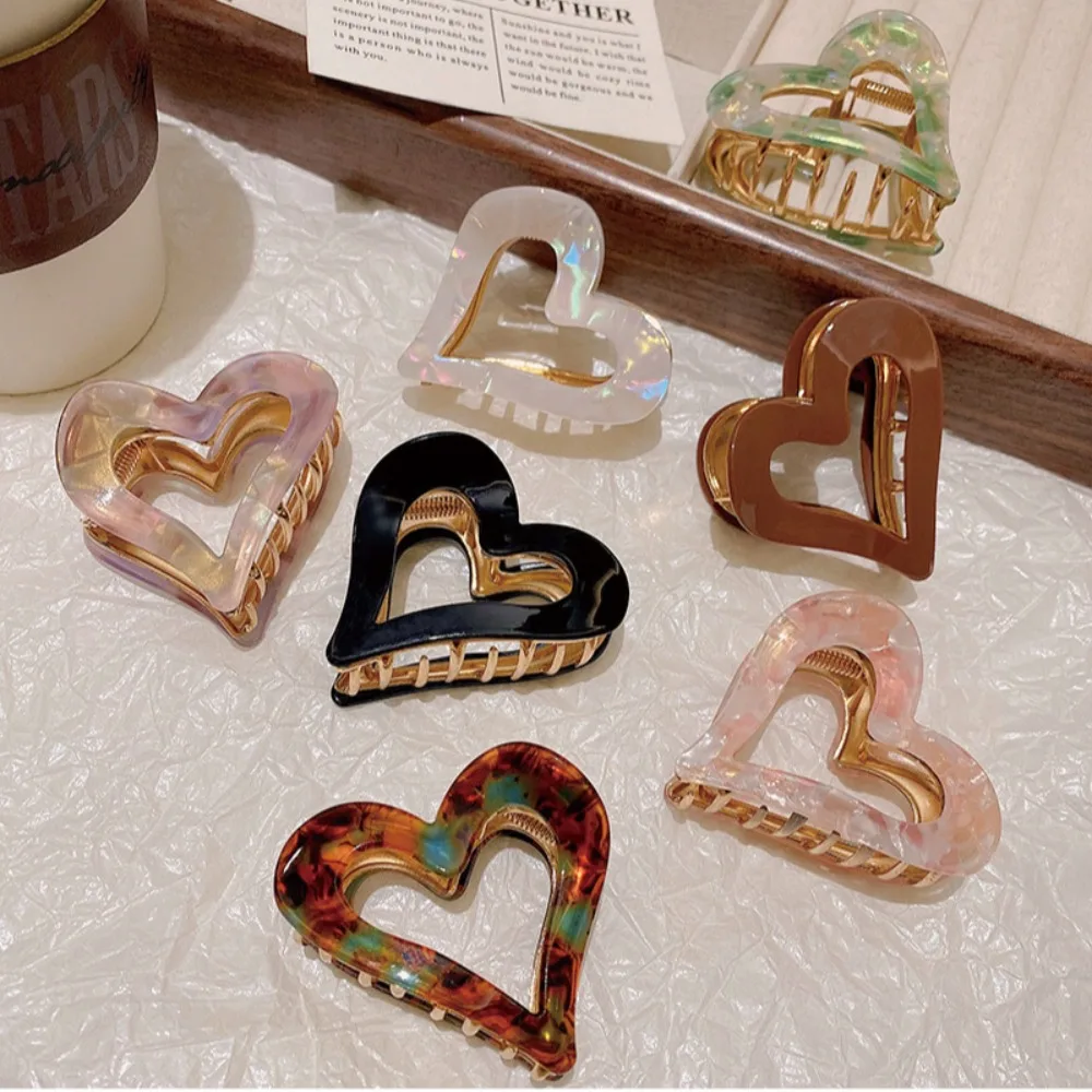 Korean Elegant Hollow Love Heart Hair Claw Clip for Women Girl Sweet Cute Shark Clip Temperament Hair Accessories
Korean Elegant Hollow Love Heart Hair Claw Clip for Women Girl Sweet Cute Shark Clip Temperament Hair Accessories