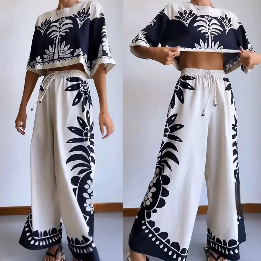 Elegant Printed Loose Pants Sets For Women Casual O Neck Half Sleeve Short Tops Wide Leg Pants Suit 2025
Elegant Printed Loose Pants Sets For Women Casual O Neck Half Sleeve Short Tops Wide Leg Pants Suit 2025