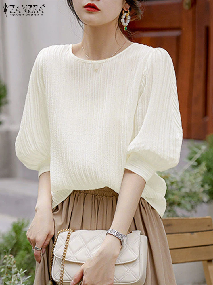 2025 ZANZEA Casual Blouses Women Summer 3/4 Puff Sleeve Elegant OL Shirts Tunic Tops Fashion Pleated Loose Solid Color Blusas
2025 ZANZEA Casual Blouses Women Summer 3/4 Puff Sleeve Elegant OL Shirts Tunic Tops Fashion Pleated Loose Solid Color Blusas