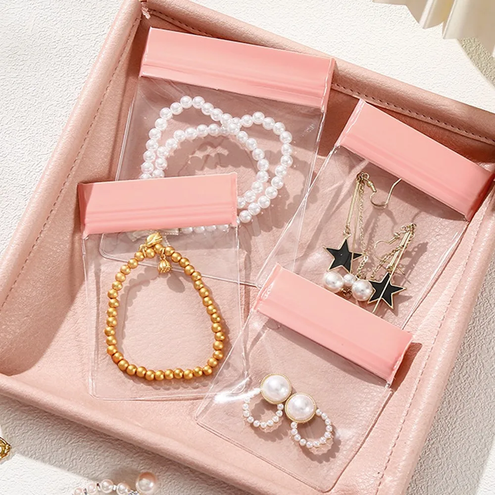 10pcs Pink Anti Tarnish Jewelry Bag Small Clear EVA Pouches Organizer for Travel Gold Silver Ring Earing Chain Bracelet Storage
10pcs Pink Anti Tarnish Jewelry Bag Small Clear EVA Pouches Organizer for Travel Gold Silver Ring Earing Chain Bracelet Storage
