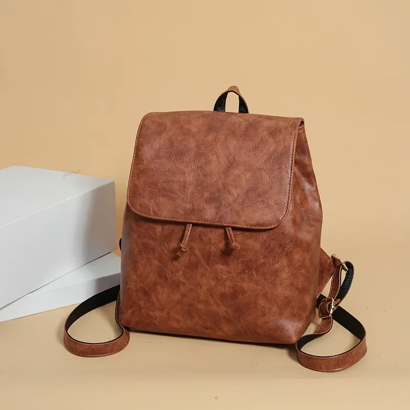 Однотонный модный рюкзак из искусственной кожи, большая вместительная откидная крышка, универсальная сумка на плечо, лидер продаж 2024, сумки для женщин Bolsas Femininas 
Однотонный модный рюкзак из искусственной кожи, большая вместительная откидная крышка, универсальная сумка на плечо, лидер продаж 2024, сумки для женщин Bolsas Femininas