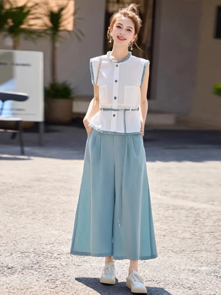 2025 summer new Korean style high-end professional temperament sleeveless shirt with nine inch wide leg pants set
2025 summer new Korean style high-end professional temperament sleeveless shirt with nine inch wide leg pants set