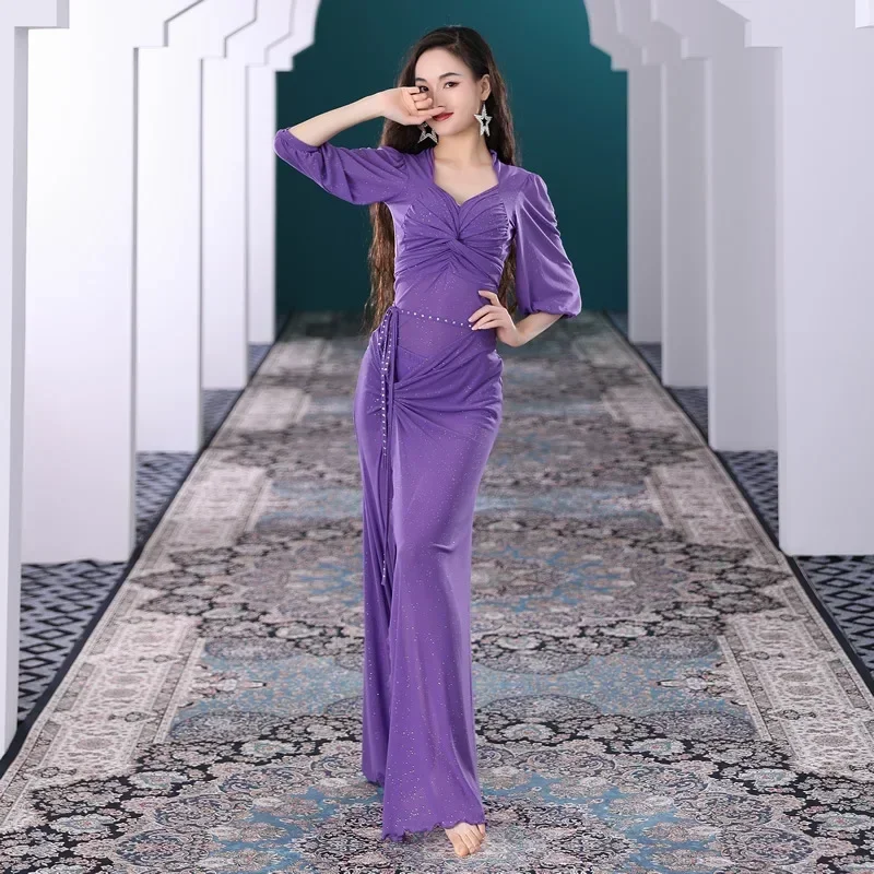 Профессиональный тренировочный костюм для танца живота, новый осенне-зимний костюм, длинная юбка, костюм для выступлений, сексуальный костюм для начинающих
Профессиональный тренировочный костюм для танца живота, новый осенне-зимний костюм, длинная юбка, костюм для выступлений, сексуальный костюм для начинающих