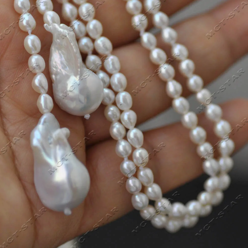 Z14608 48" 25mm White Rice Baby Freshwater Pearl Necklace Baroque Keshi Pearl Pendant
Z14608 48" 25mm White Rice Baby Freshwater Pearl Necklace Baroque Keshi Pearl Pendant