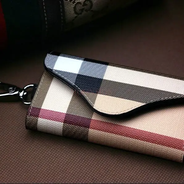 1pcs Plaid leather lined car remote key bag, men's and women's cowhide lined multifunctional waist hanging key bag
1pcs Plaid leather lined car remote key bag, men's and women's cowhide lined multifunctional waist hanging key bag