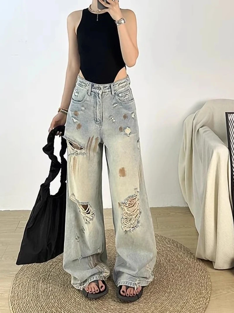Women's Blue Ripped Graffiti Jeans Retro Y2k Street Style American 90s Loose Wide-Leg Pants Straight Distressed Denim Trousers
Women's Blue Ripped Graffiti Jeans Retro Y2k Street Style American 90s Loose Wide-Leg Pants Straight Distressed Denim Trousers