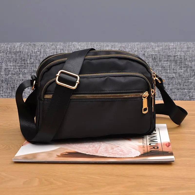 Multilayer Bag Female Crossbody Bag New Style All-match Waterproof Cloth Small Casual Bag Simple Business Collection Wallet
Multilayer Bag Female Crossbody Bag New Style All-match Waterproof Cloth Small Casual Bag Simple Business Collection Wallet