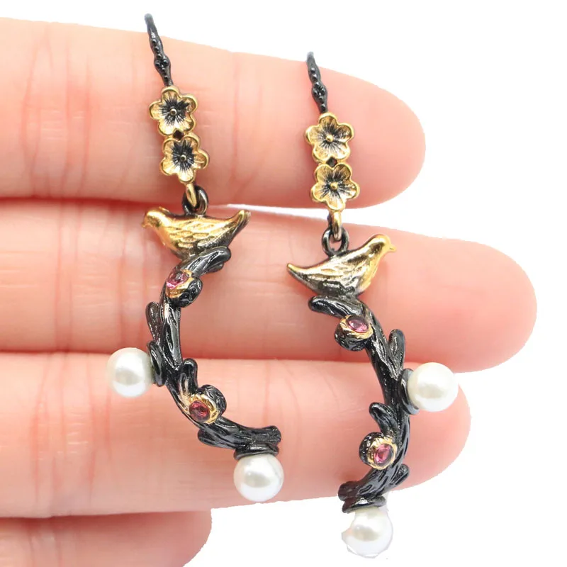 Buy 3 Get 1 Free 51x11mm 7.4g Songbird Shape White Pearl Peridot Emerald Pink Tourmaline Women Present Black Gold Earrings
Buy 3 Get 1 Free 51x11mm 7.4g Songbird Shape White Pearl Peridot Emerald Pink Tourmaline Women Present Black Gold Earrings