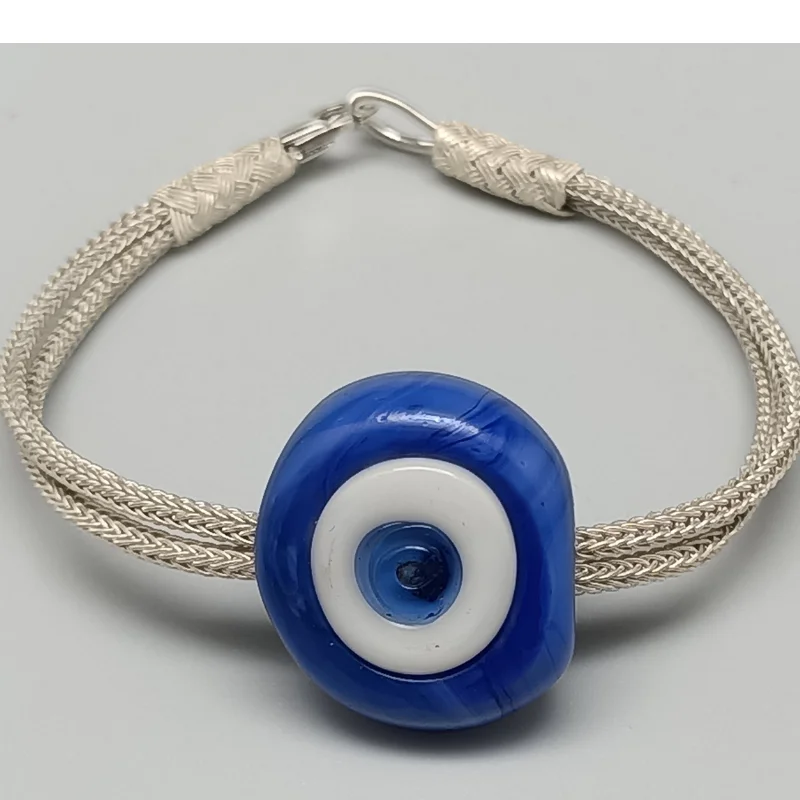 Браслет Трабзон Kazaz ручной вязки из серебра 1000 пробы с синей искусственной кожей
Браслет Трабзон Kazaz ручной вязки из серебра 1000 пробы с синей искусственной кожей