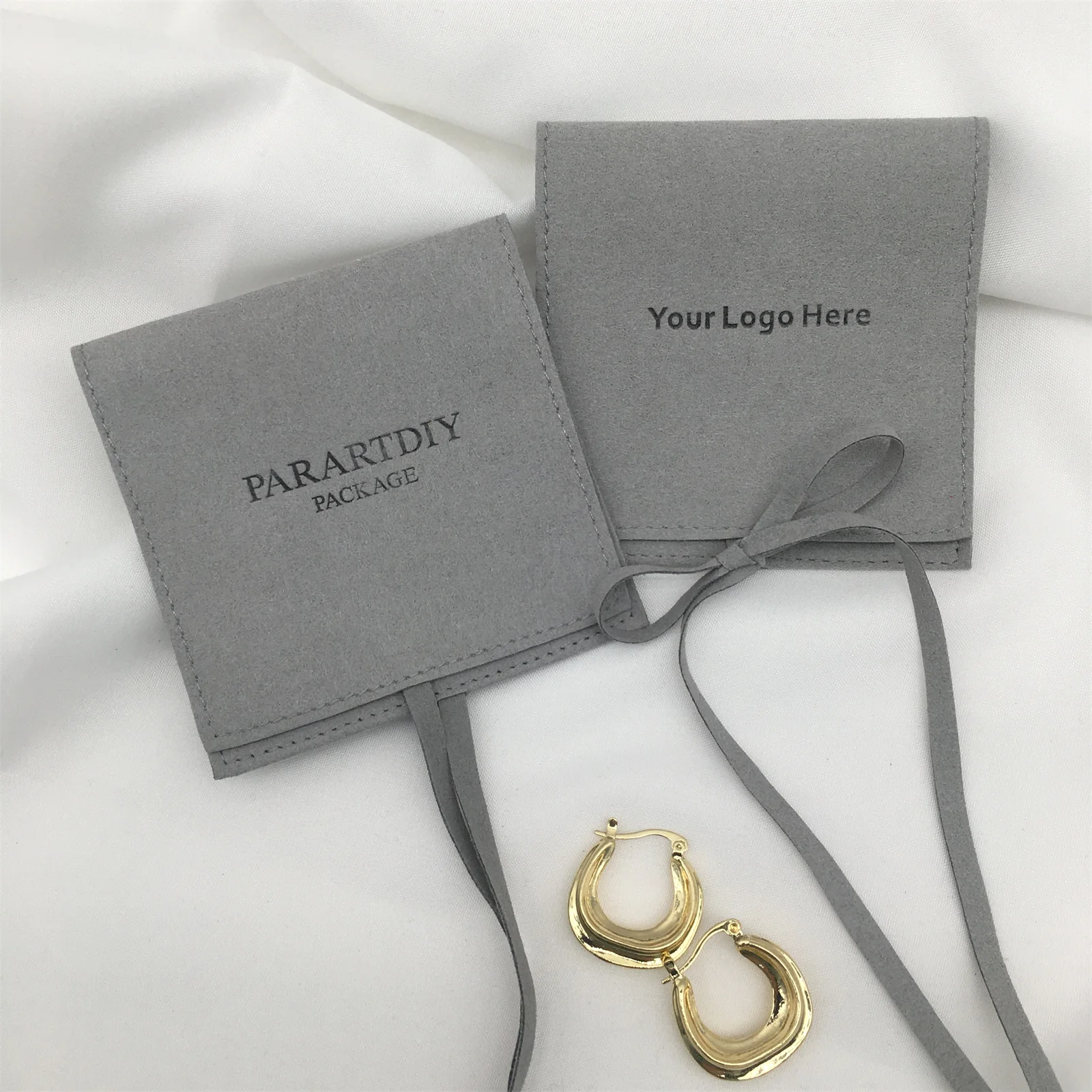 50pcs jewelry pouch personalized bags with custom logo deboss microfiber envelope bag jewelry packaging pouch bulk sale
50pcs jewelry pouch personalized bags with custom logo deboss microfiber envelope bag jewelry packaging pouch bulk sale