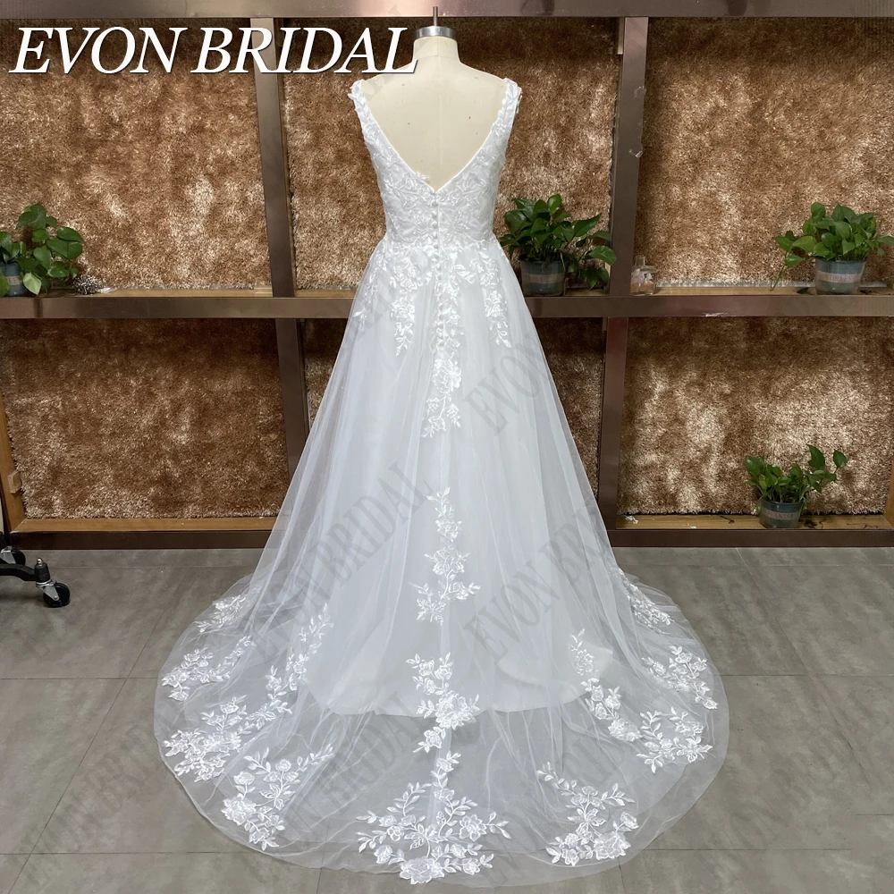 فستان زفاف من EVON BRIDAL بتصميم حقيقي وياقة مربعة مزين بحمالات من الدانتيل ، فستان عروس أنيق بدون ظهر مصنوع حسب الطلب حقيقيّ يربّت حزب عنق 2024 Wonmen عروس عرس ثوب Applique شريط شريط شريط أسود ثوب أنيق مفتوح ظهر زرّ ع