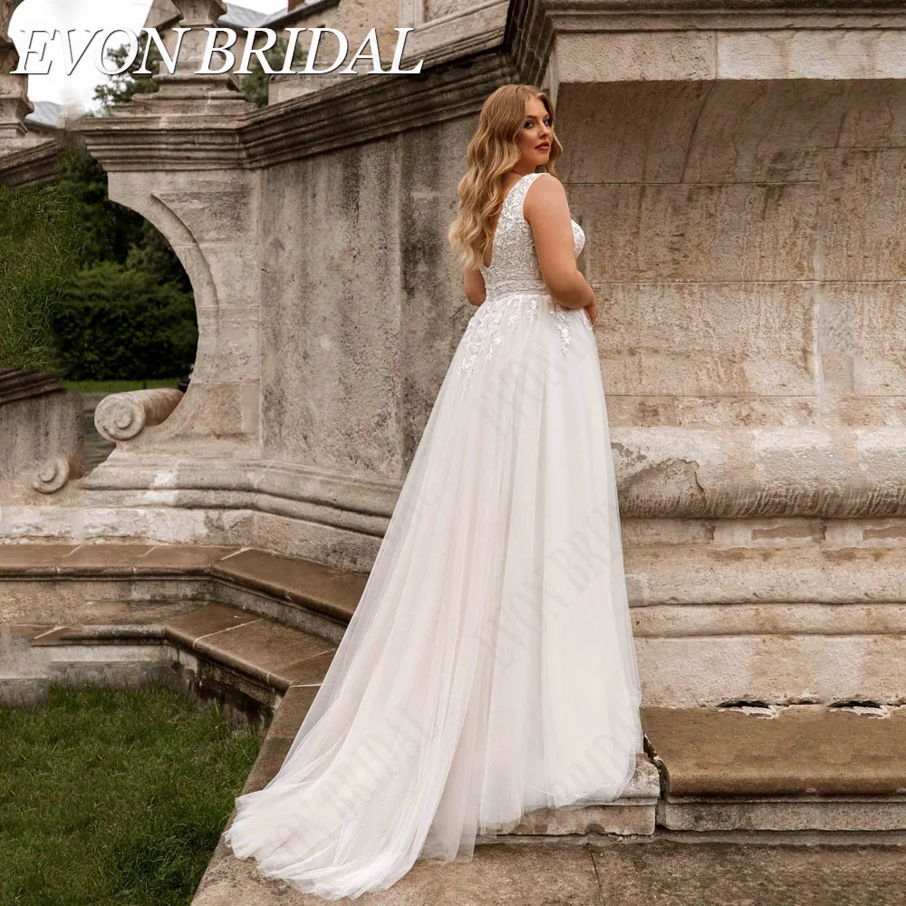 البوهيمي ثوب الزفاف بلا أكمام XL الخامس الرقبة مزدوجة الشيفونفستان زفاف من EVON BRIDAL Boho بدون أكمام مقاس كبير بياقة مزدوجة على شكل v بدون ظهر مزين من التل على شكل حرف a فساتين زفاف من vestidos de novia