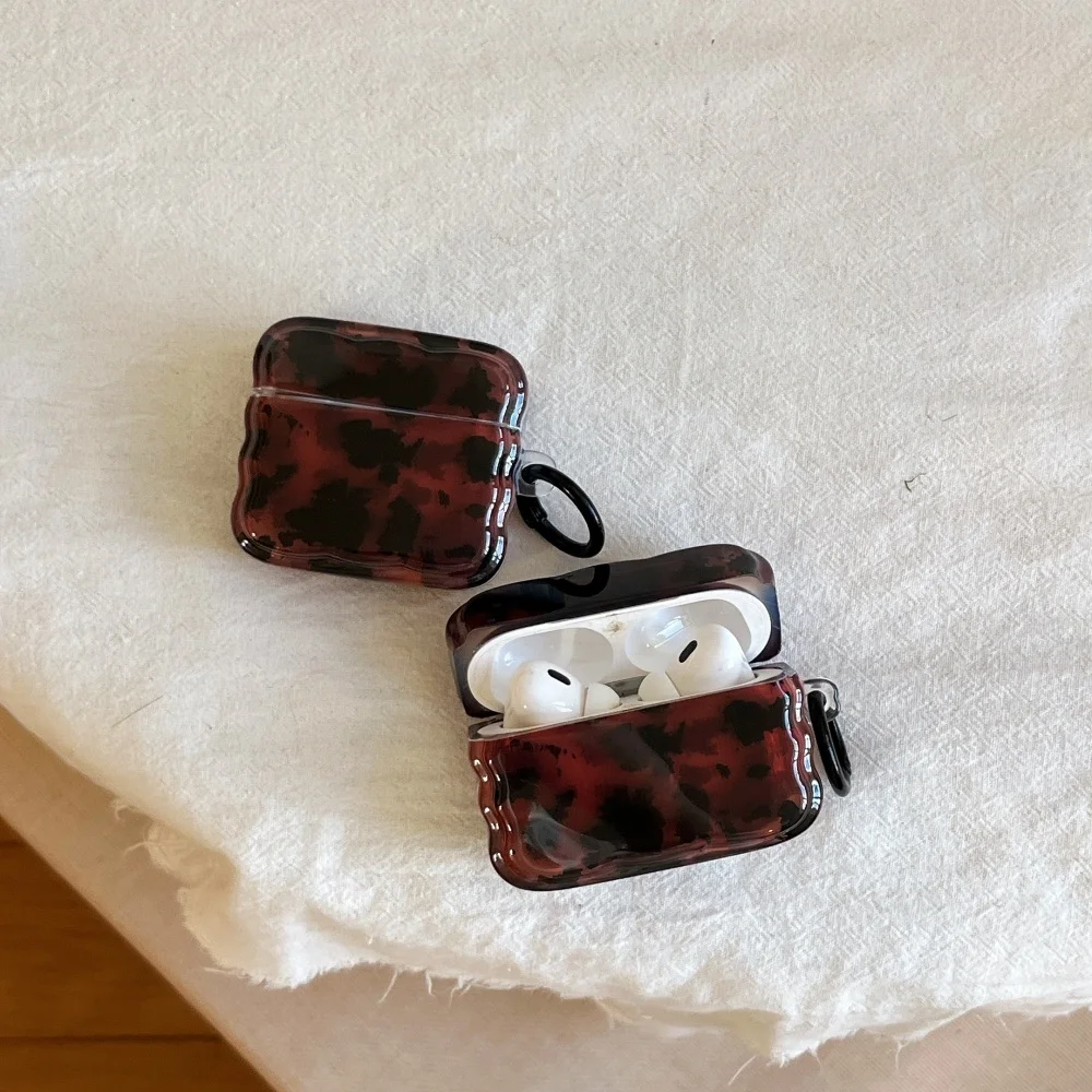 

Stylish amber pattern headphone protective case with twist edges,suitable for AirPods 4/3/Pro/2/3,new shockproof protective case