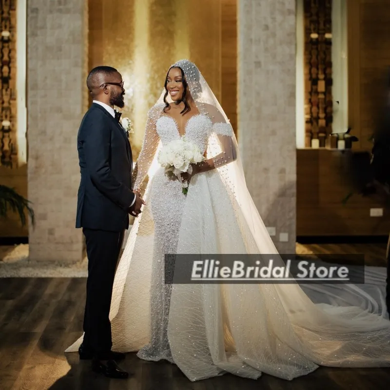 Abiti da sposa di perle di lusso con strascico staccabile Collo trasparente Maniche lunghe Abiti da sposa a sirena vestito sposa 2 in 1 Personalizzato
