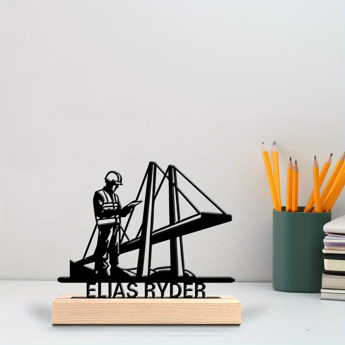 A Stylish And Personalized Metal Sculpture, Suitable for Civil Engineers, Featuring a Wooden Base.