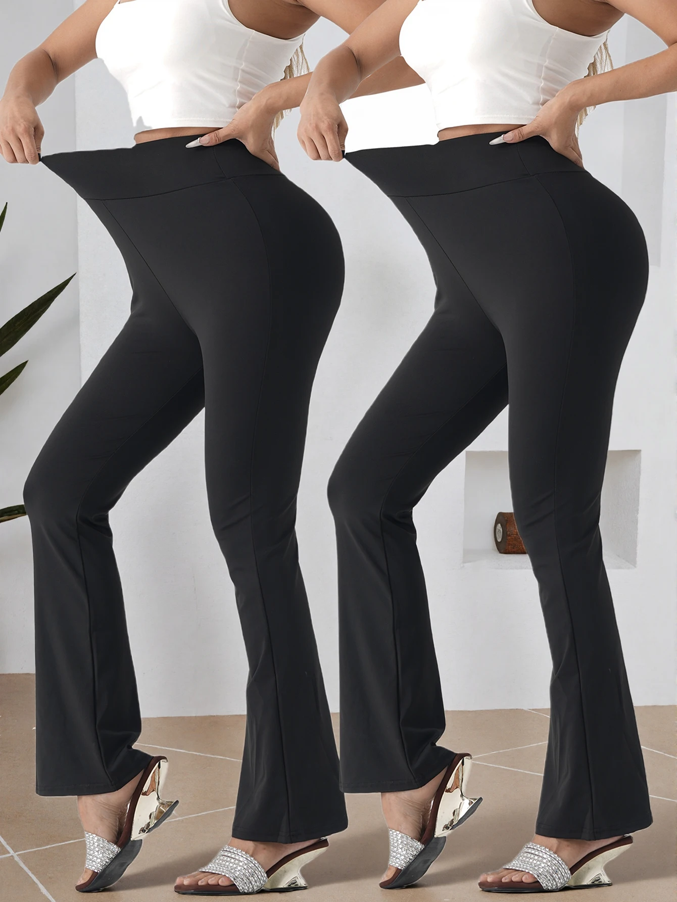 

Две пары женских расклешенных брюк для йоги с эффектом коррекции живота и подтяжки ягодиц, с перекрестным поясом.