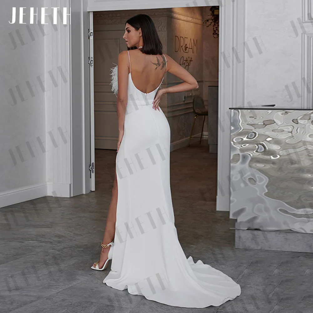 JEHETH Sexy Feather abito da sposa sirena donna elegante Side Split Backless abito da sposa Spaghetti Strap Boat Neck Robe De Mariée Abito da sposa laterale di sirena Abito da sposa con piume elastiche Spalle italiane