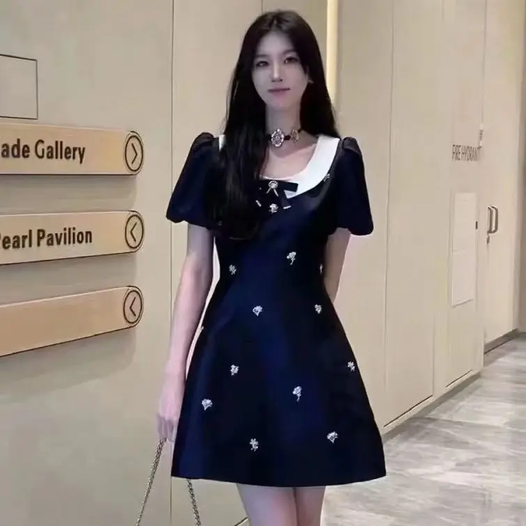 

Elegant bow decorated beaded puff sleeve mini dress