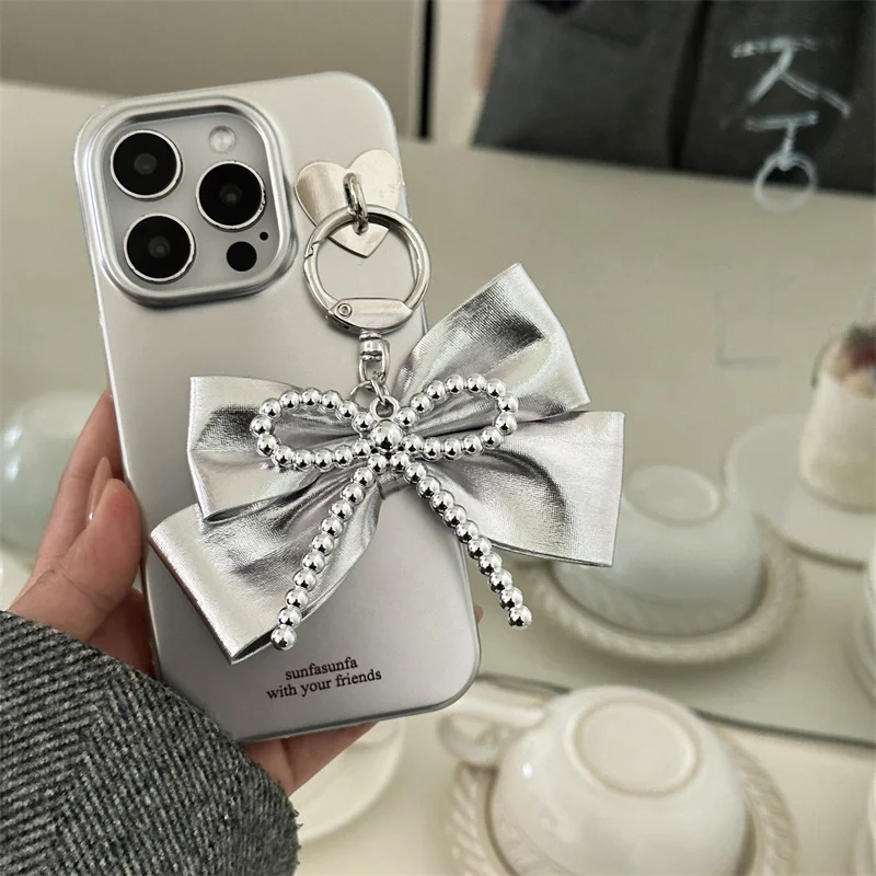 

Fashion Pearl beaded Bow Pendant Charm phone case for iPhone 11 12 13 Pro 14 15 16 Pro Max Cute Shockproof cover For womens Capa