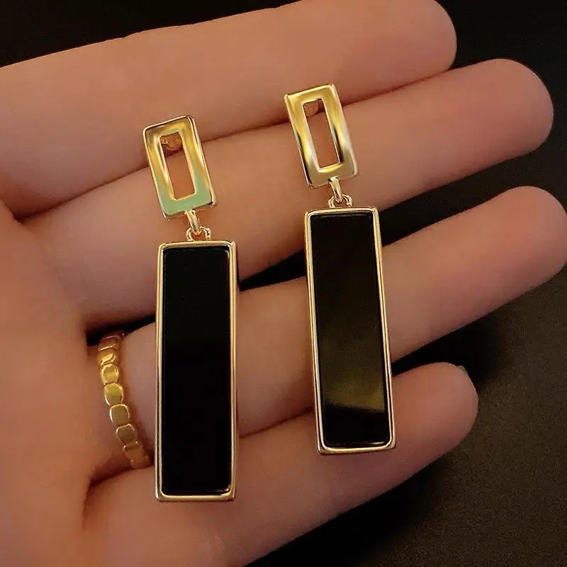 

NoirLuxe Geometric Drop Earrings