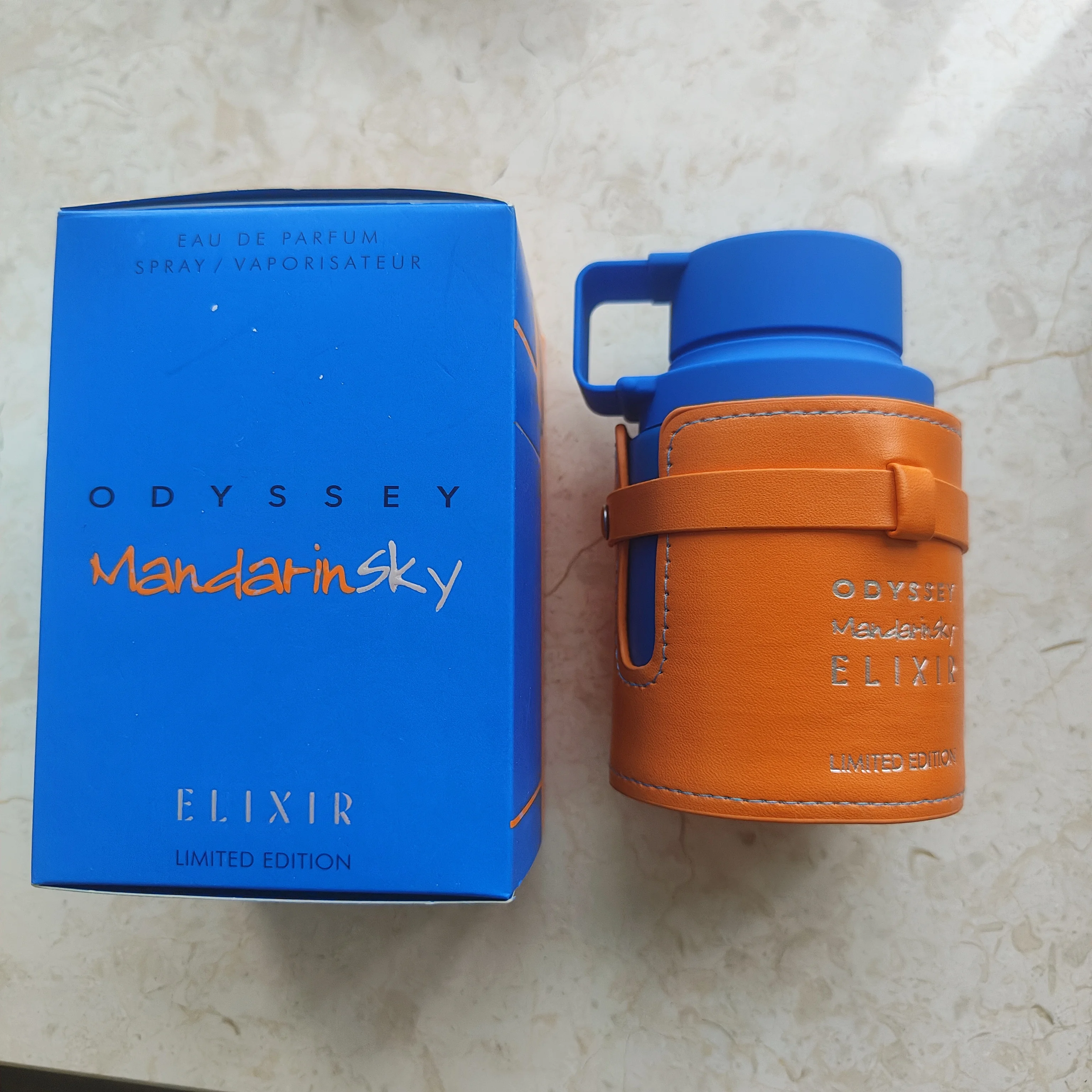 Armaf Odyssey Mandarin Sky Elixir 3.4 Oz Aroma Cítrico Fresco con Notas de Ámbar, Fragancia Amaderada y Frutal de Larga Duración para Uso Diario